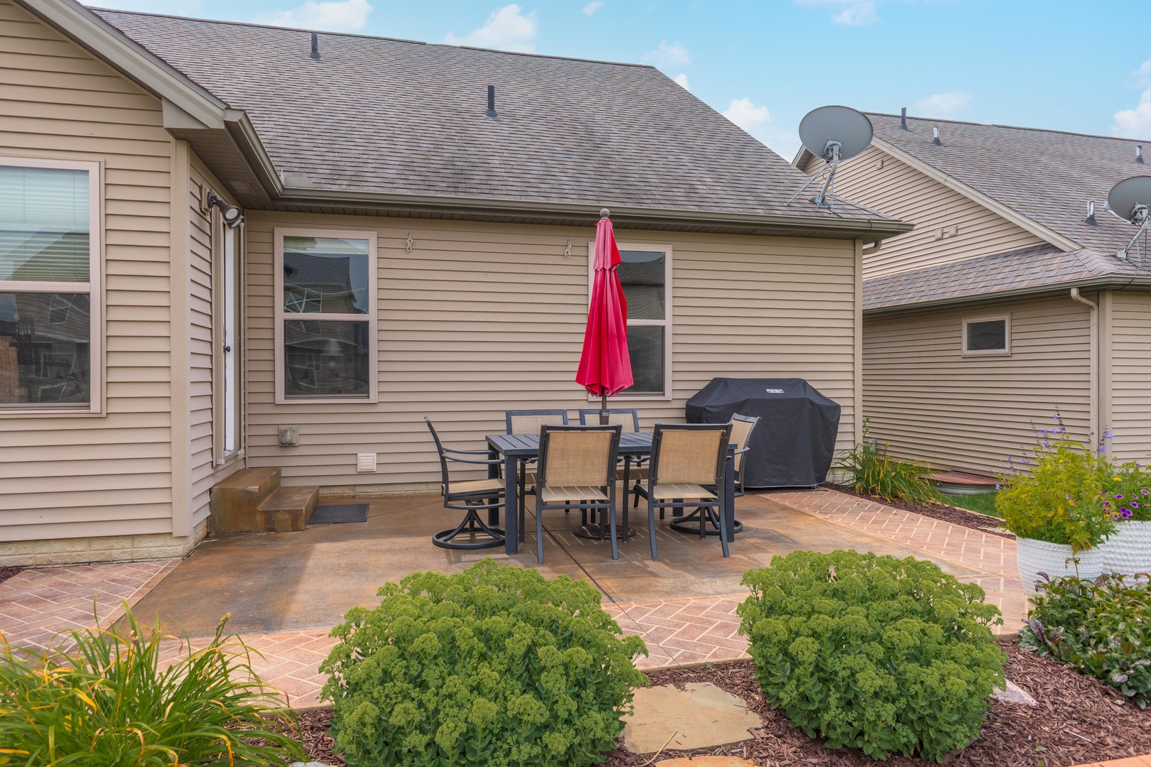 2610 Shepard Road Normal, IL 61761 - Photo 42 of 46 a backyard of a house with table and chairs