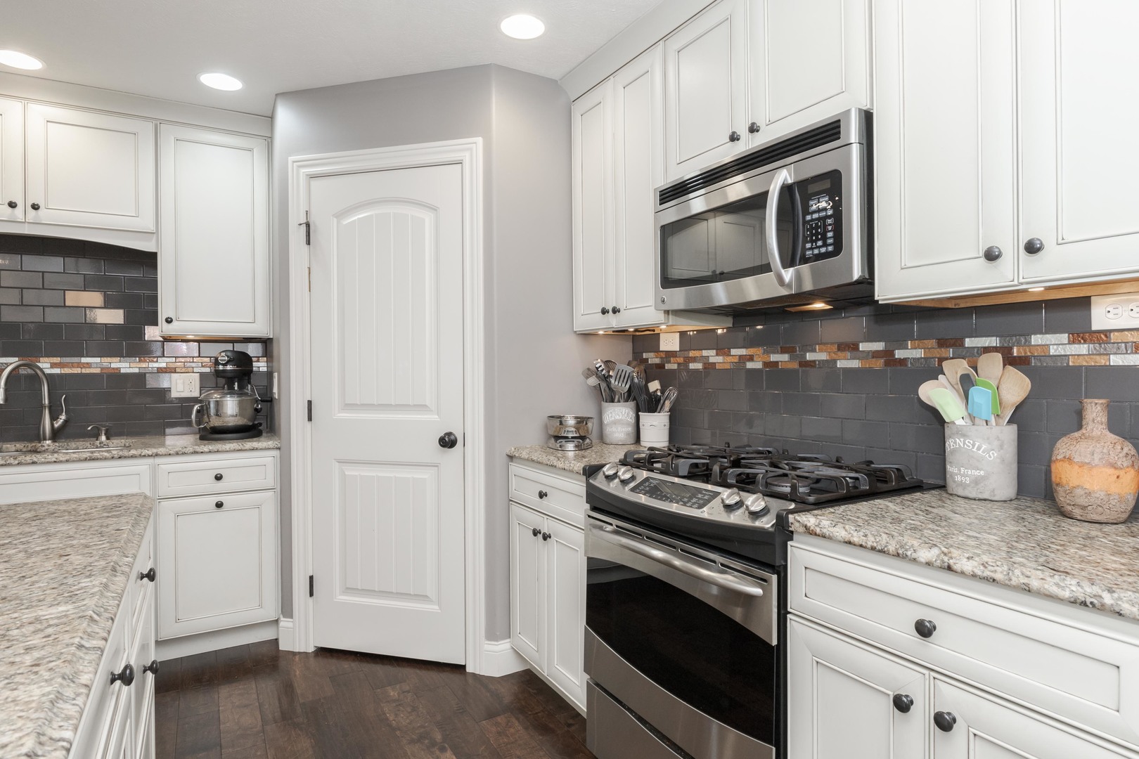 2610 Shepard Road Normal, IL 61761 - Photo 6 of 46 a kitchen with granite countertop cabinets and steel stainless steel appliances