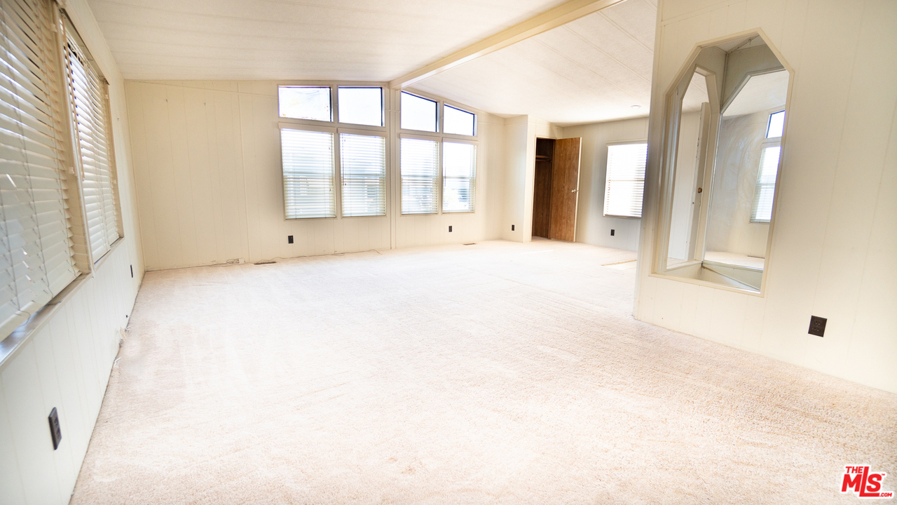 17701 South Avalon Boulevard, Unit 147 Carson, CA 90746 - Photo 11 of 28 a view of an empty room with window