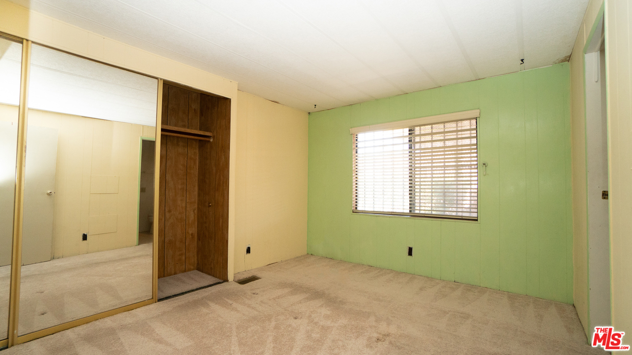 17701 South Avalon Boulevard, Unit 147 Carson, CA 90746 - Photo 16 of 28 a view of an empty room with a window