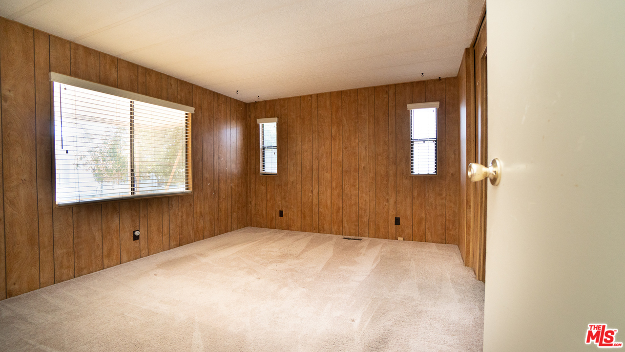 17701 South Avalon Boulevard, Unit 147 Carson, CA 90746 - Photo 20 of 28 a view of an empty room with a window