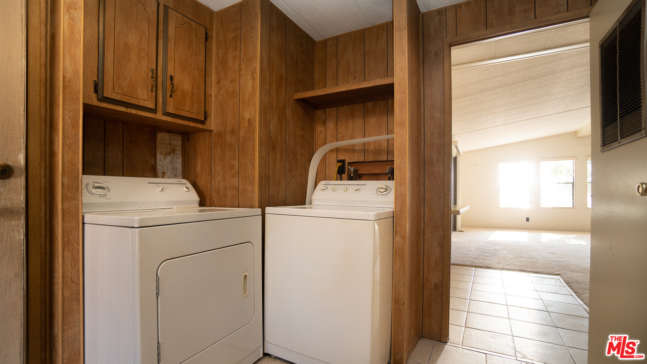 17701 South Avalon Boulevard, Unit 147 Carson, CA 90746 - Photo 25 of 28 a utility room with dryer and washer