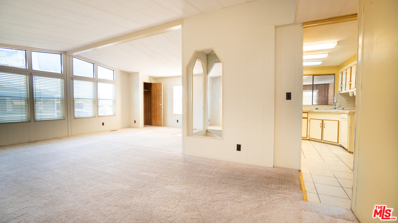 17701 South Avalon Boulevard, Unit 147 Carson, CA 90746 - Photo 10 of 28 a view of an empty room with a window