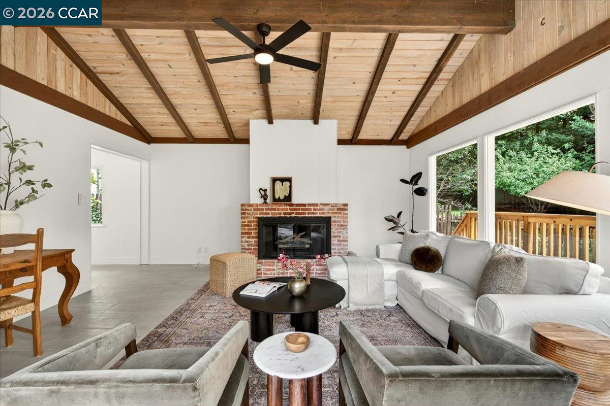 24 Las Vegas Road Orinda, CA 94563 - Photo 20 of 47 a living room with furniture and a fireplace