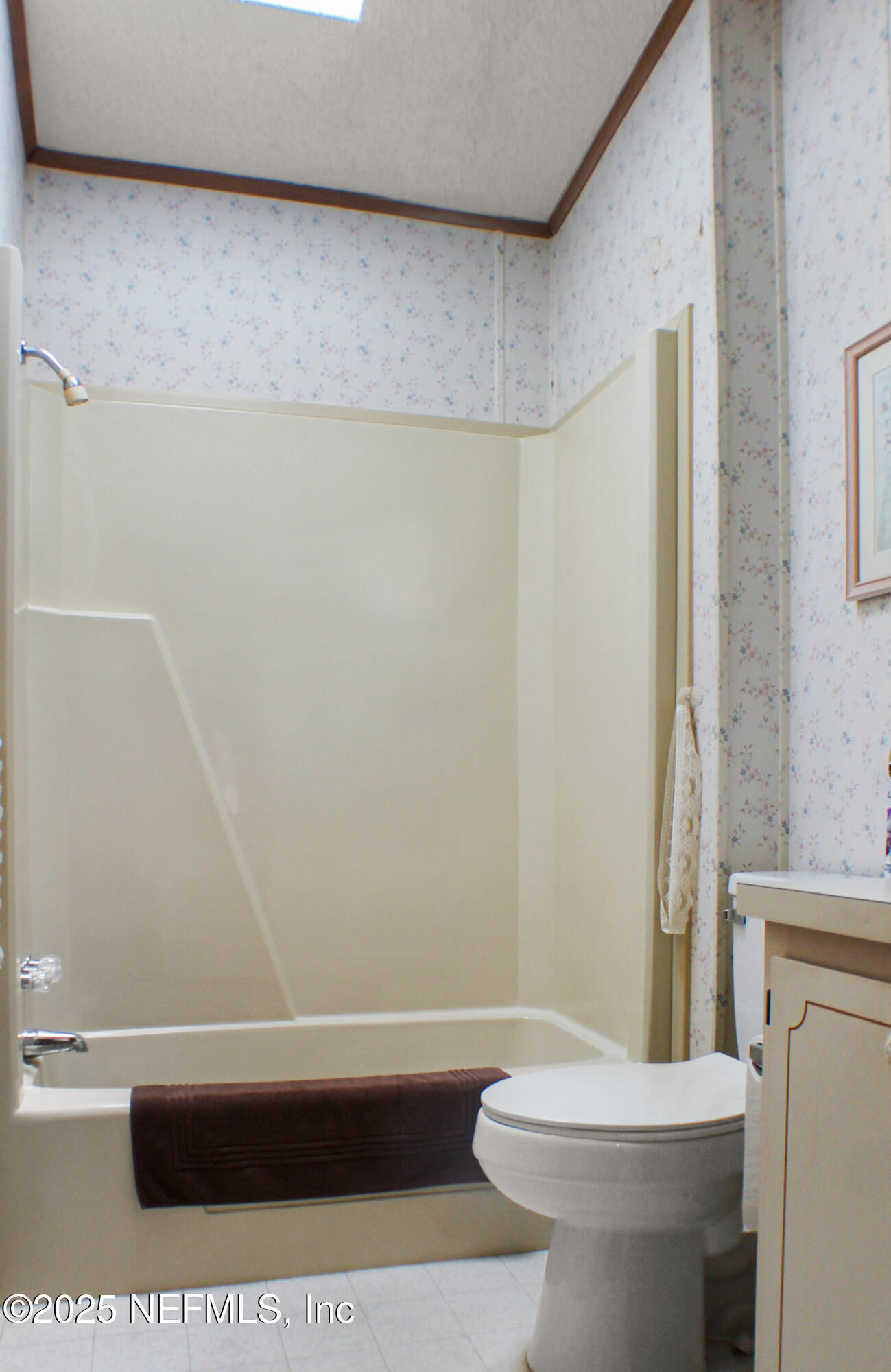 134 Magnolia Street Satsuma, FL 32189 - Photo 33 of 62 a bathroom with a sink a toilet and a shower