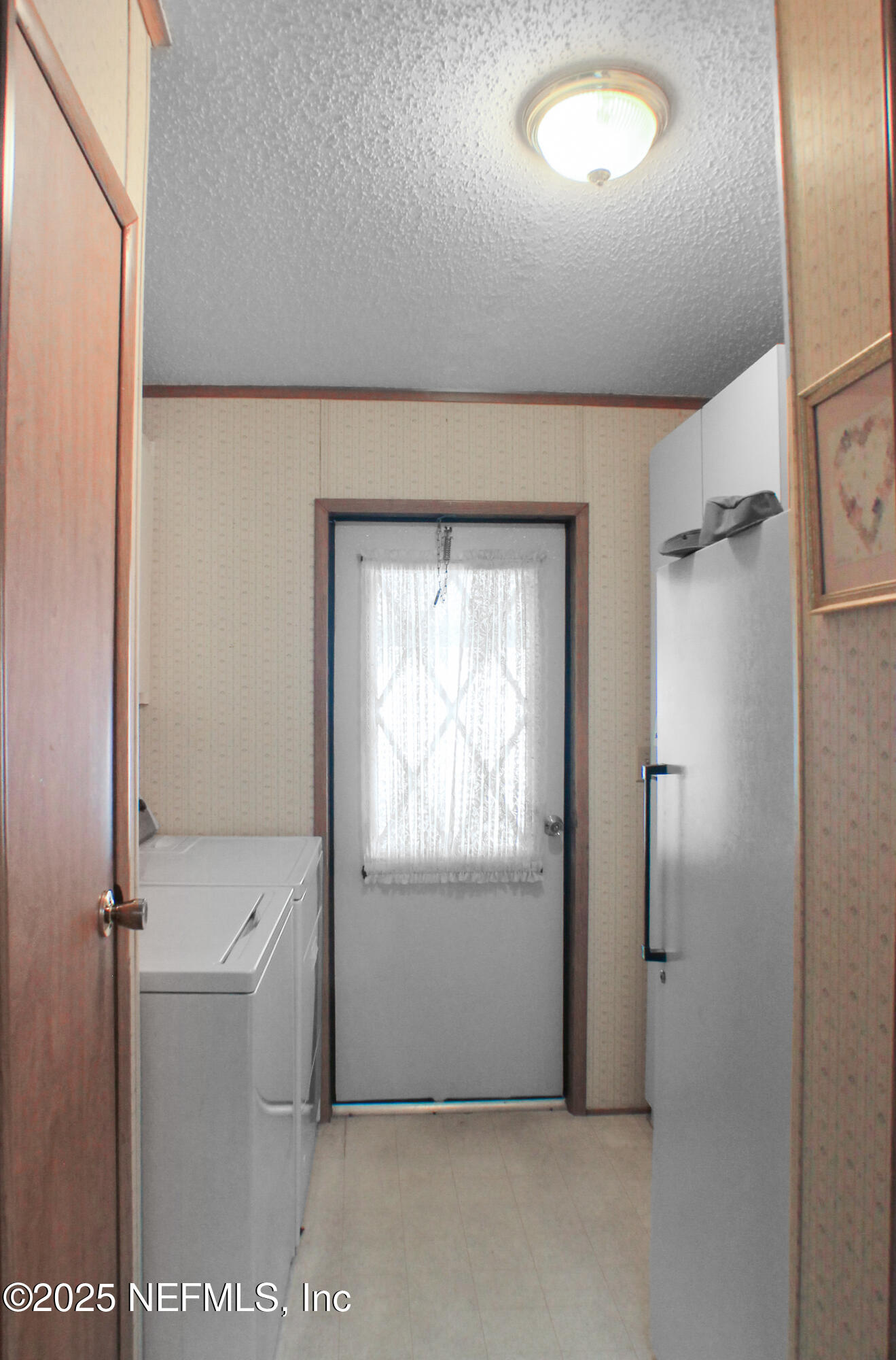 134 Magnolia Street Satsuma, FL 32189 - Photo 37 of 62 a view of an empty room with a window