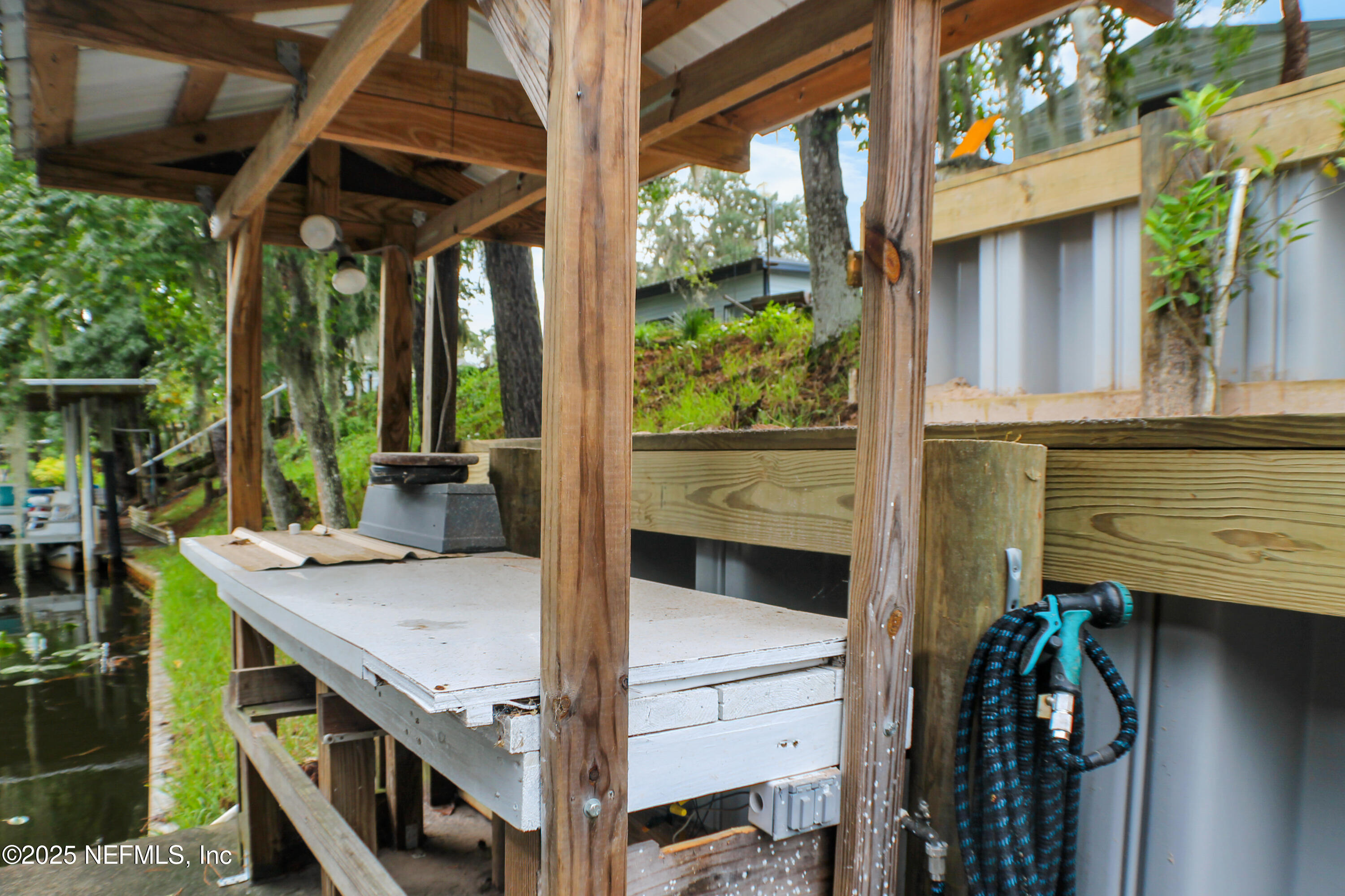 134 Magnolia Street Satsuma, FL 32189 - Photo 53 of 62 a view of outdoor space kitchen and patio