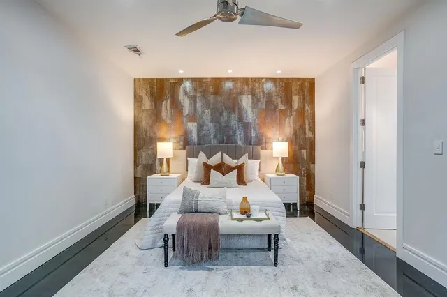 a bed room with a bed and a couch