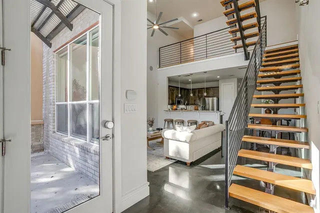 a view of living room with furniture and window