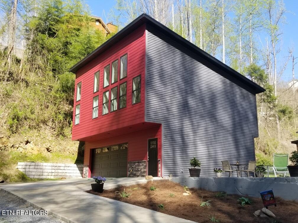 667 Turkey Nest Road Gatlinburg, TN 37738 - Photo 1 of 29 a view of a house with a street