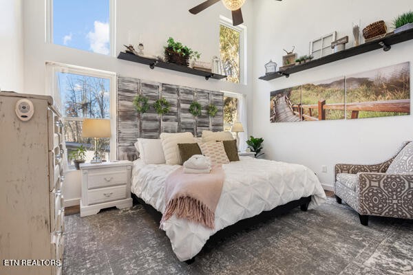 667 Turkey Nest Road Gatlinburg, TN 37738 - Photo 12 of 29 a spacious bedroom with a bed and window