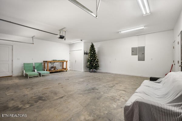 667 Turkey Nest Road Gatlinburg, TN 37738 - Photo 20 of 29 a bed room with furniture and a flat screen tv