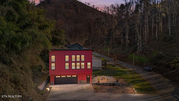 667 Turkey Nest Road Gatlinburg, TN 37738 - Photo 23 of 29 a front view of a house with a yard