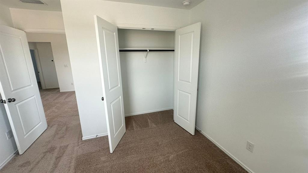 192 Rodney Boat Road Kyle, TX 78640 - Photo 19 of 38 An inviting closet with ample hanging space is ready for your wardrobe.