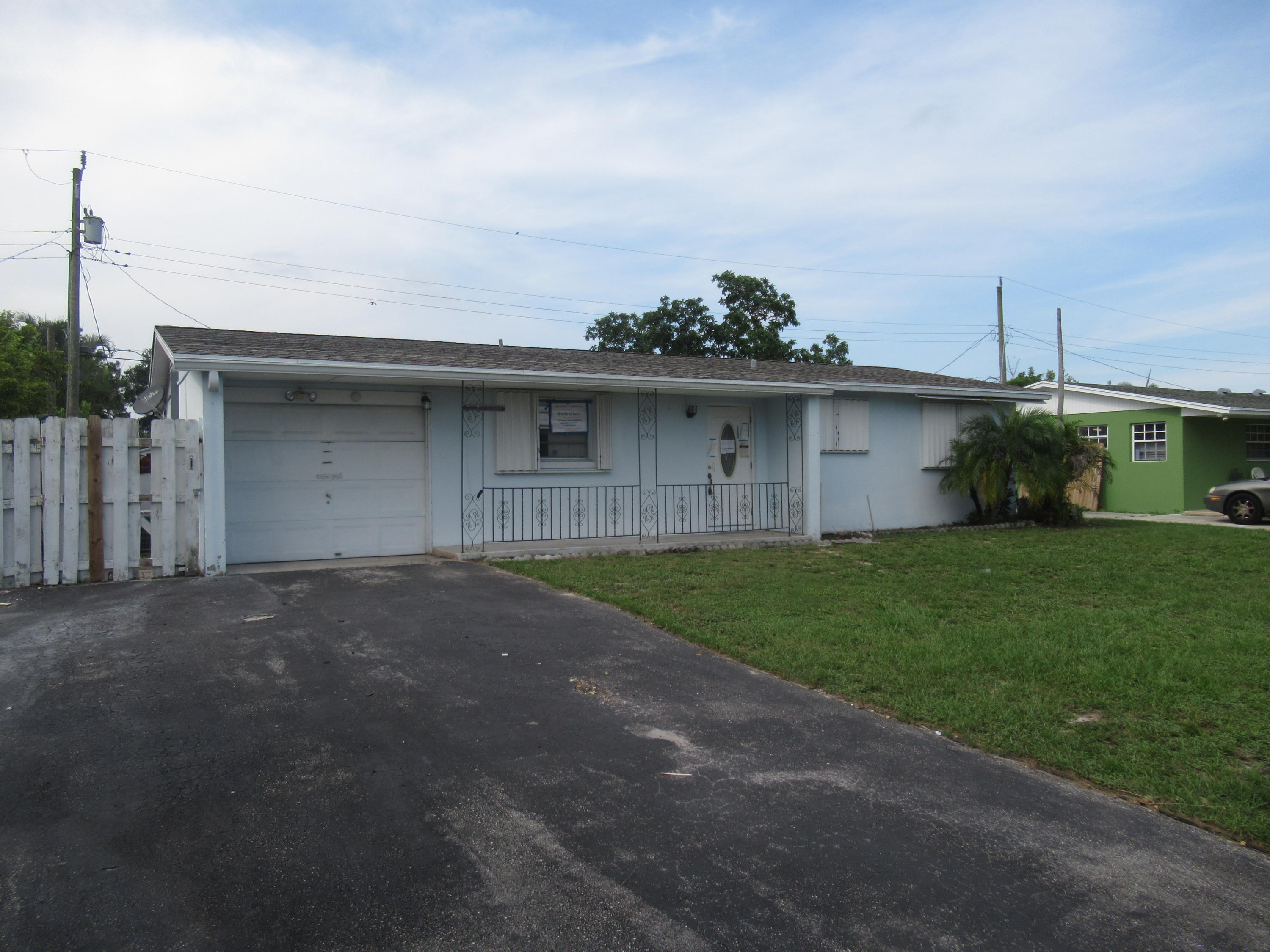 6115 Haddon Road West Palm Beach, FL 33417 - Photo 1 of 14 Front