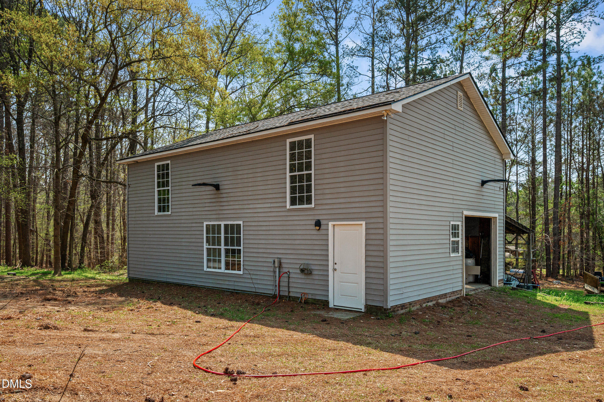 1957 Hilltop Road Raleigh, NC 27610 - Photo 39 of 46 a view of a house with a yard
