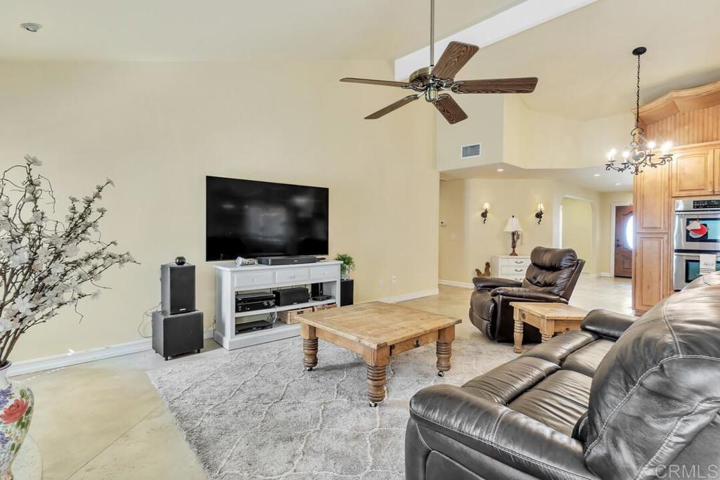 10447 Cadwell Road Santee, CA 92071 - Photo 12 of 32 a living room with furniture and a flat screen tv