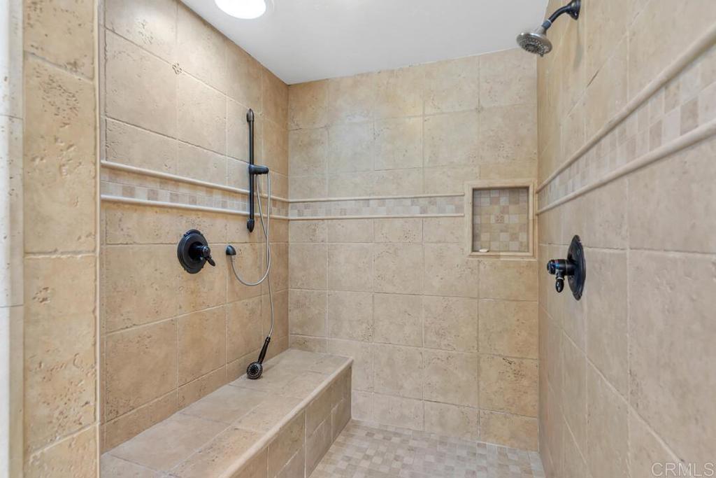 10447 Cadwell Road Santee, CA 92071 - Photo 16 of 32 a bathroom with a shower