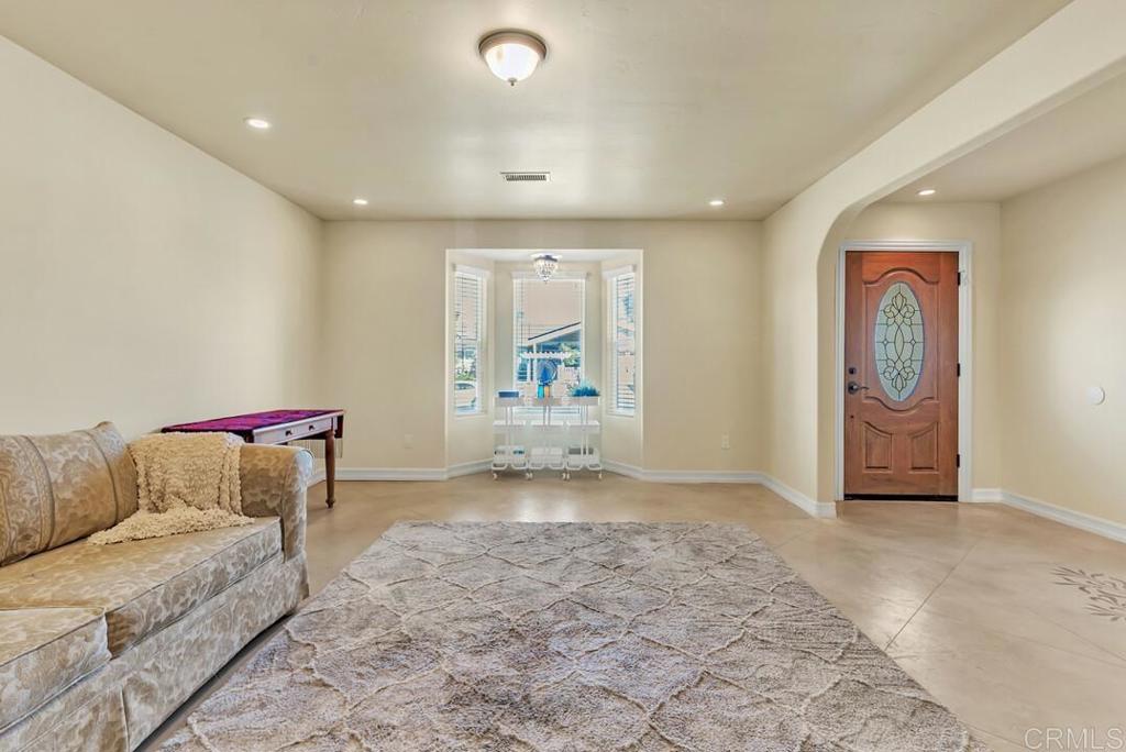 10447 Cadwell Road Santee, CA 92071 - Photo 18 of 32 a living room with furniture and a window