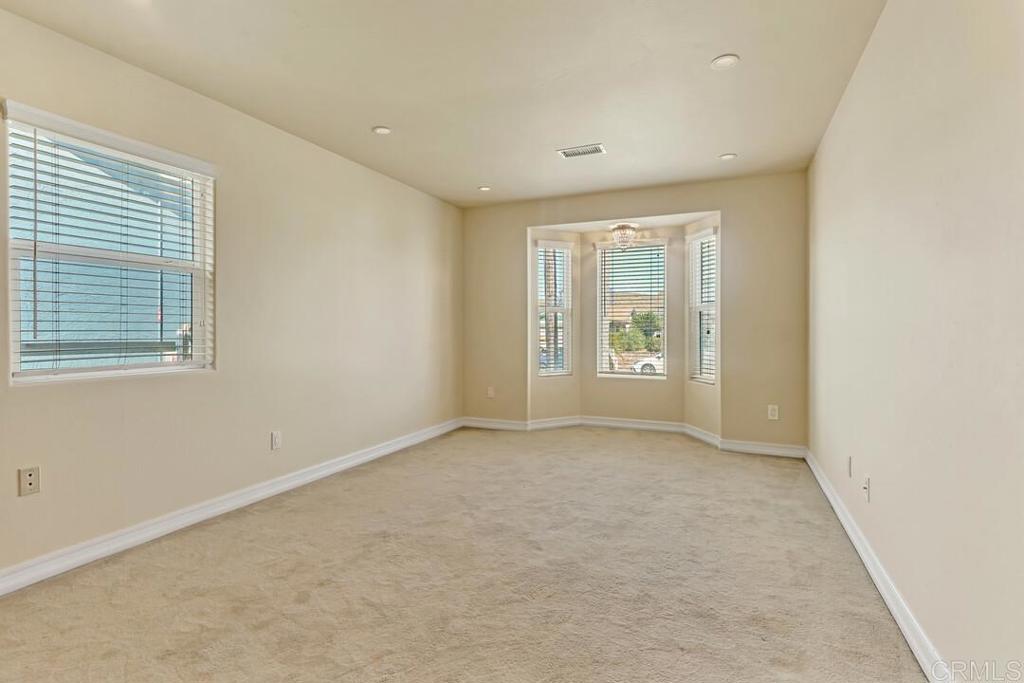 10447 Cadwell Road Santee, CA 92071 - Photo 21 of 32 an empty room with windows