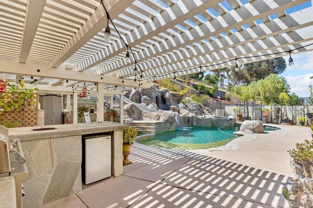 10447 Cadwell Road Santee, CA 92071 - Photo 23 of 32 a view of a chairs and tables in the patio