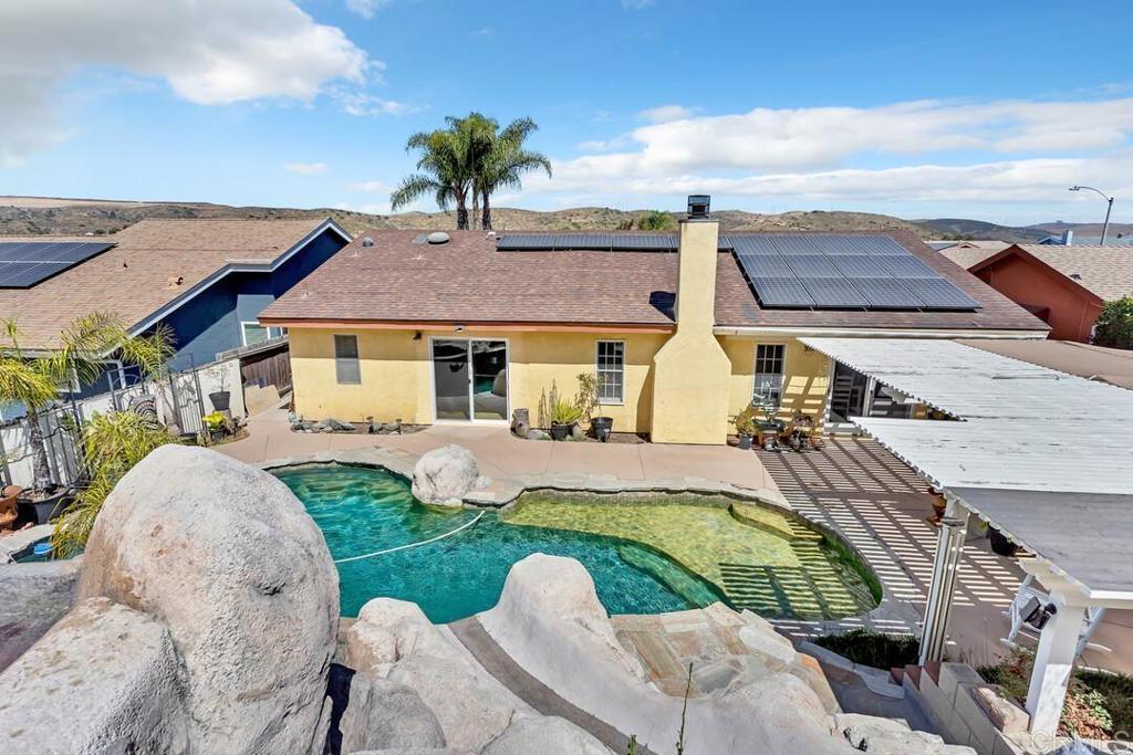 10447 Cadwell Road Santee, CA 92071 - Photo 27 of 32 a aerial view of a house with swimming pool garden and patio