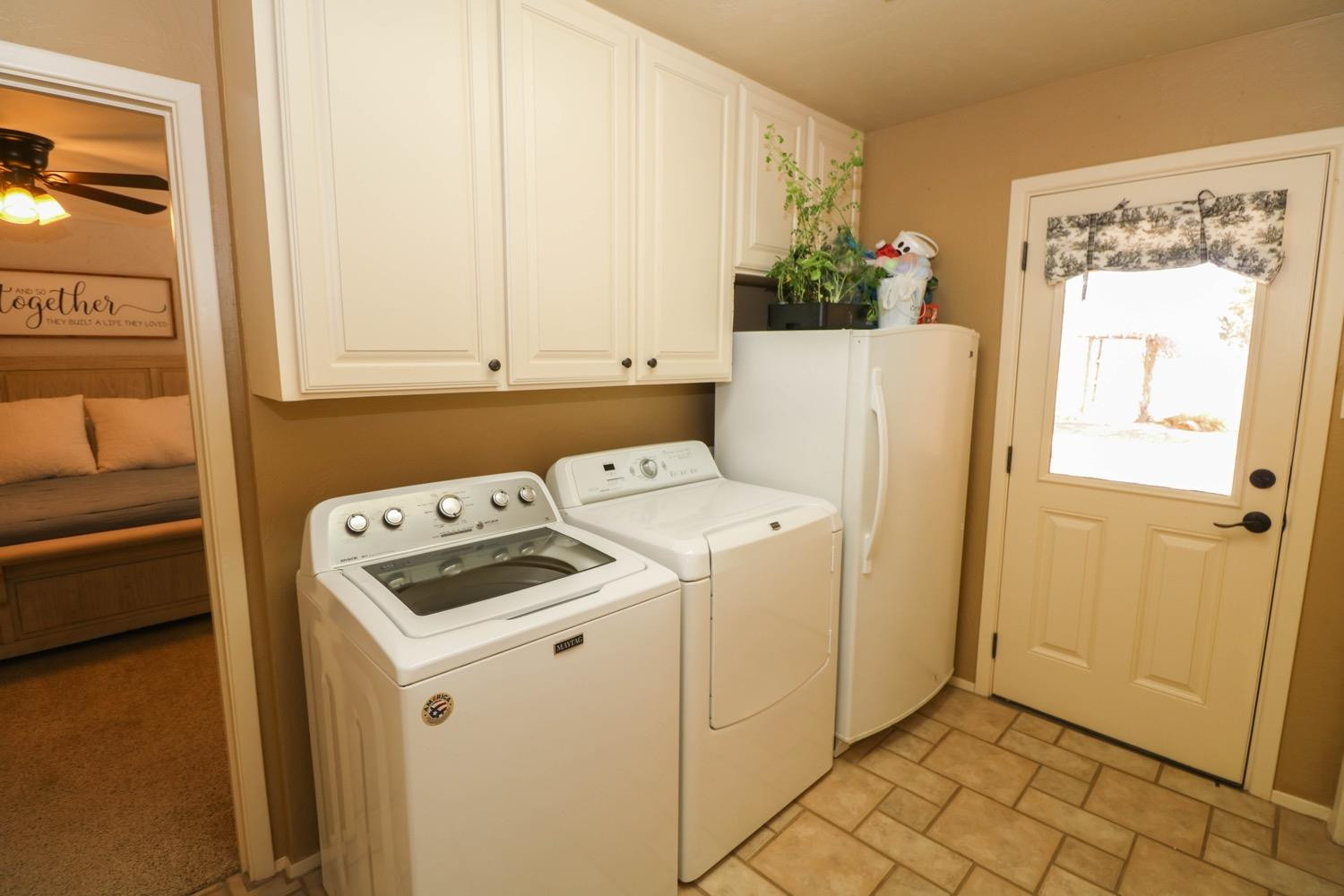 311 County Road 74 Muleshoe, TX 79347 - Photo 16 of 39 a utility room with dryer and washer