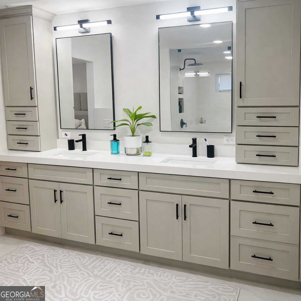 3045 Hitt Road Cumming, GA 30041 - Photo 13 of 46 a bathroom with a sink vanity and mirror