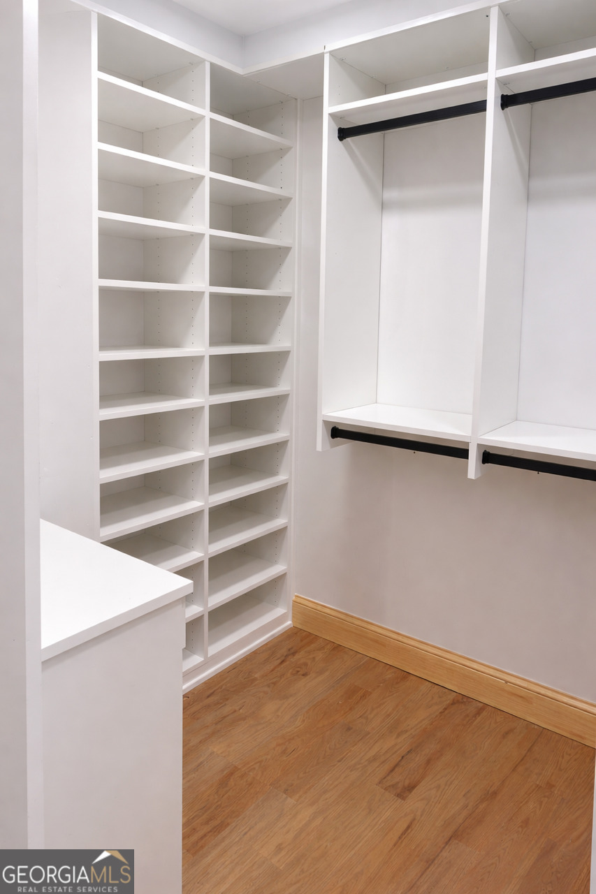 3045 Hitt Road Cumming, GA 30041 - Photo 17 of 46 a view of an empty room with a window