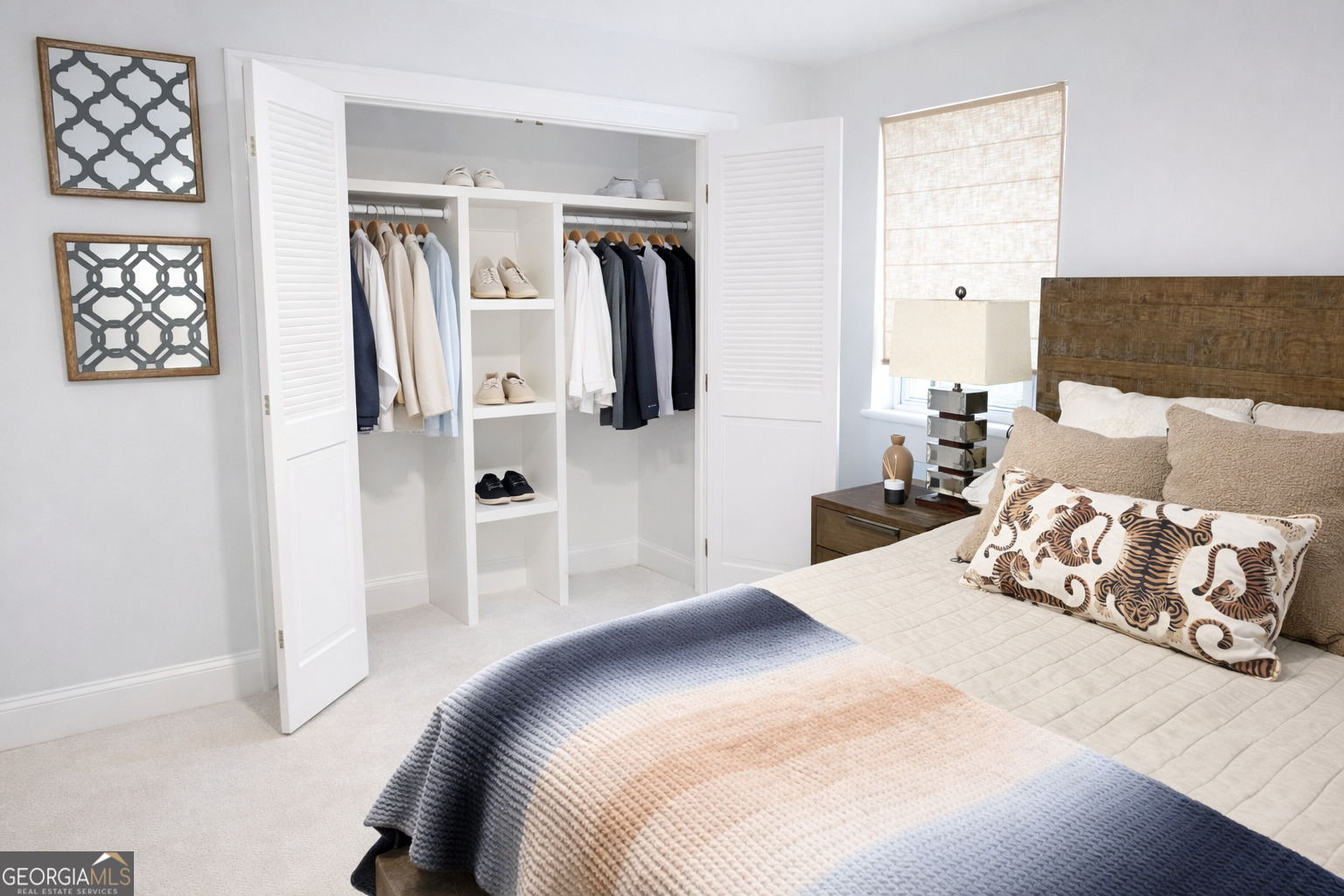 3045 Hitt Road Cumming, GA 30041 - Photo 19 of 46 a bedroom with a bed and a flat screen tv