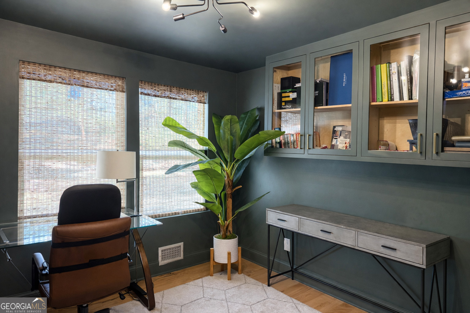 3045 Hitt Road Cumming, GA 30041 - Photo 27 of 46 a vase of flowers sitting on a table