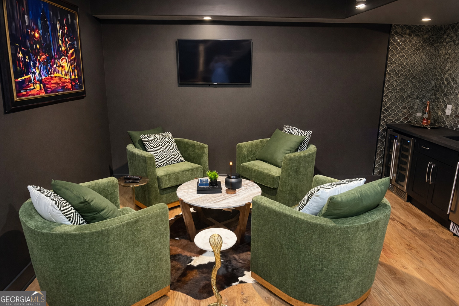 3045 Hitt Road Cumming, GA 30041 - Photo 32 of 46 a living room with furniture and a wooden floor