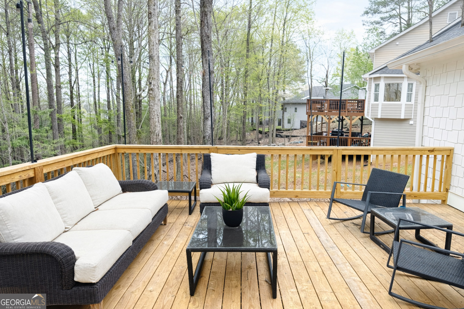 3045 Hitt Road Cumming, GA 30041 - Photo 43 of 46 a view of a chairs on a deck