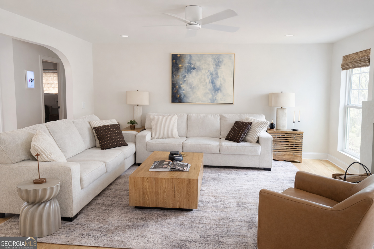 3045 Hitt Road Cumming, GA 30041 - Photo 7 of 46 a living room with furniture and a couch