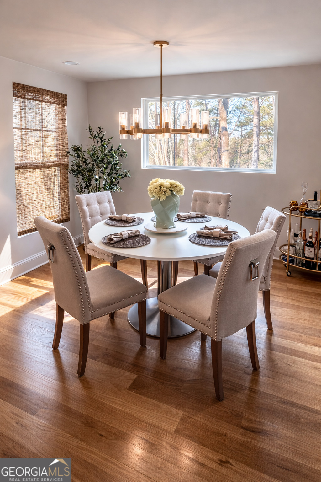 3045 Hitt Road Cumming, GA 30041 - Photo 10 of 46 a view of a dining room with furniture window and outside view