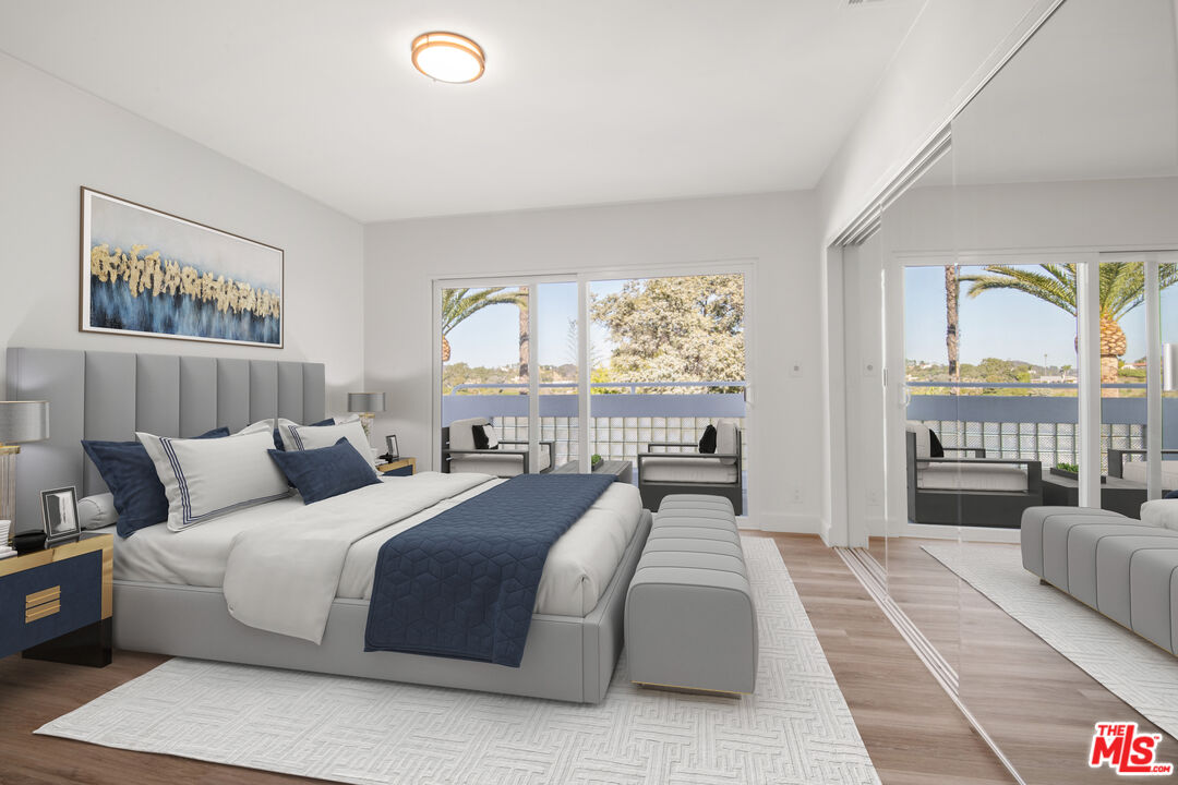 1001 Stradella Road Los Angeles, CA 90077 - Photo 13 of 28 a bedroom with a large bed and a couch