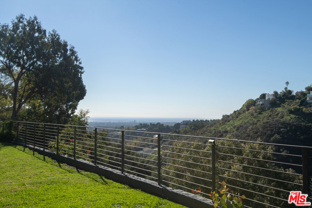 1001 Stradella Road Los Angeles, CA 90077 - Photo 26 of 28 a view of outdoor space and ocean view