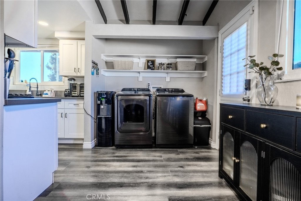 827 South Riverside Avenue Rialto, CA 92376 - Photo 15 of 60 a kitchen with stainless steel appliances granite countertop a stove a refrigerator and a sink