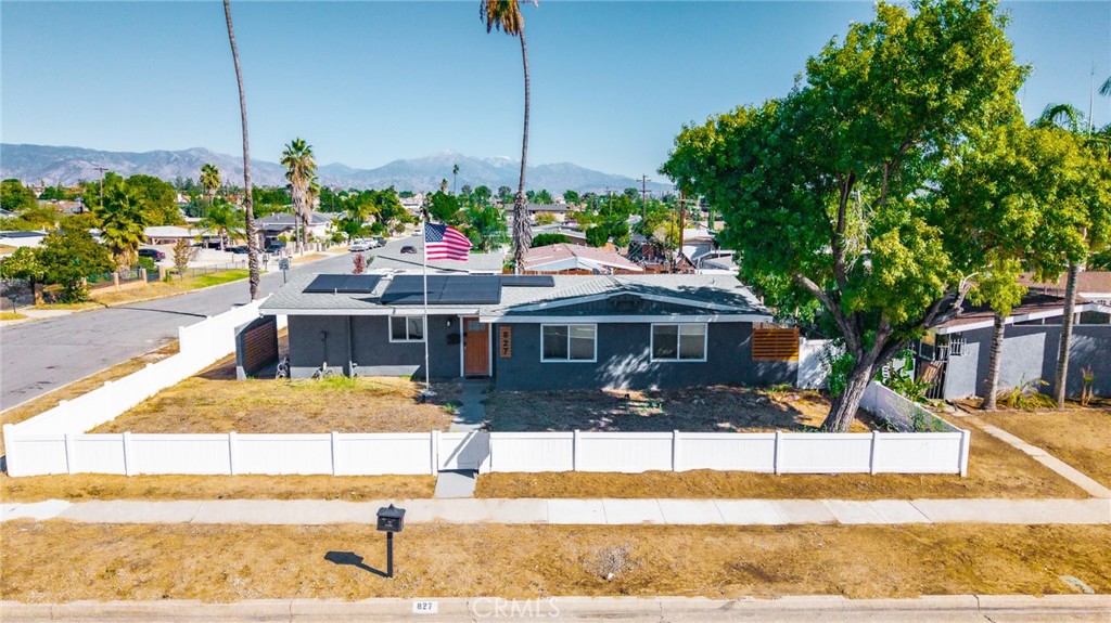 827 South Riverside Avenue Rialto, CA 92376 - Photo 3 of 60 a view of a house with a swimming pool