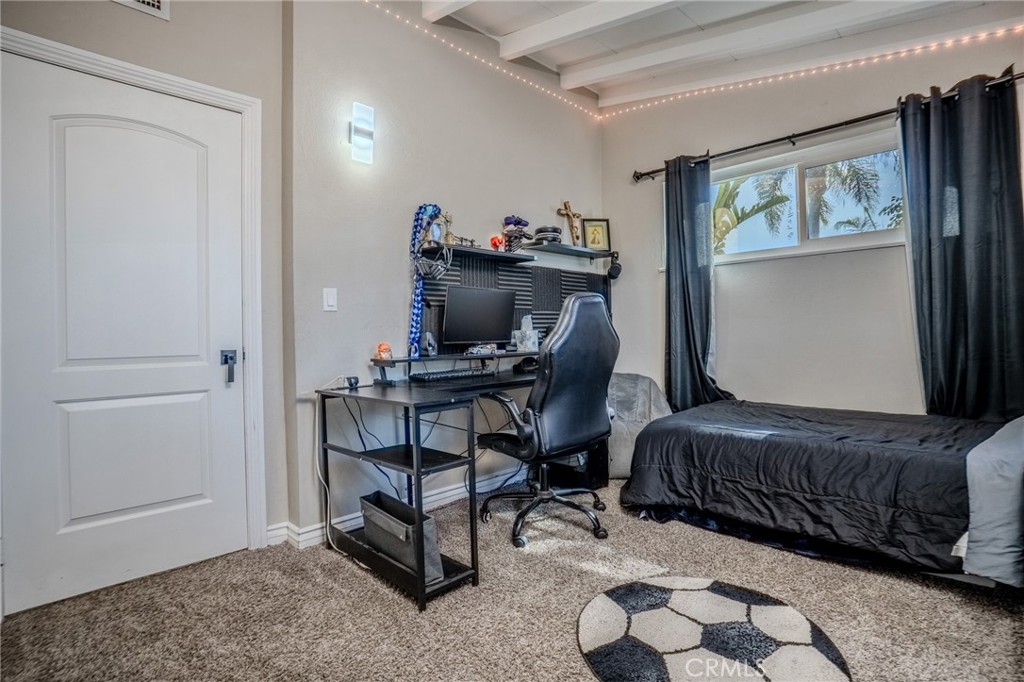 827 South Riverside Avenue Rialto, CA 92376 - Photo 32 of 60 a view of a workspace with furniture and a window