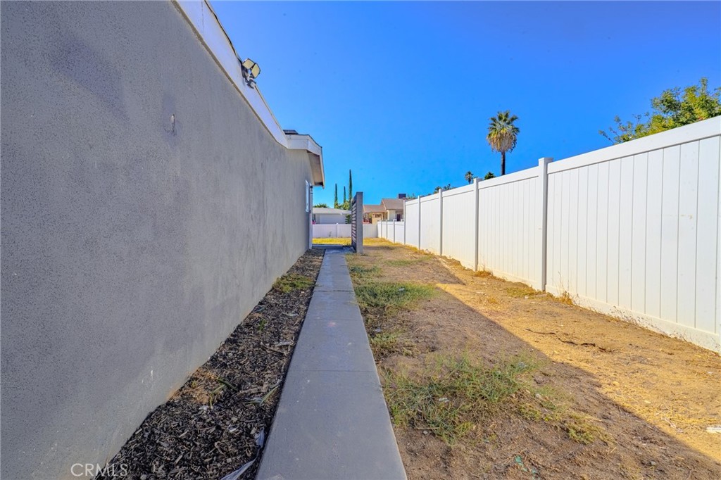 827 South Riverside Avenue Rialto, CA 92376 - Photo 33 of 60 a view of a pathway with a yard