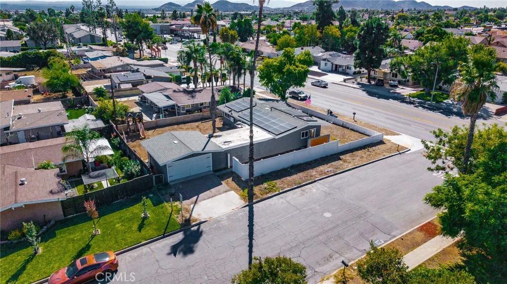827 South Riverside Avenue Rialto, CA 92376 - Photo 42 of 60 an aerial view of a backyard with a patio and garden