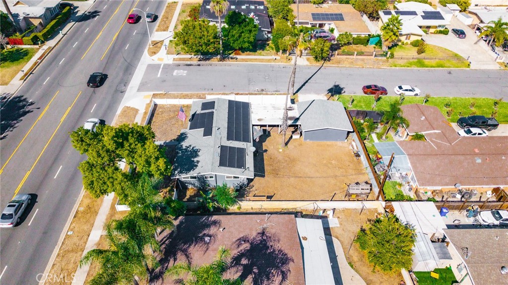 827 South Riverside Avenue Rialto, CA 92376 - Photo 45 of 60 an aerial view of a house with a yard and a large pool