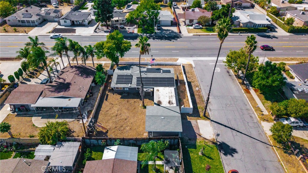 827 South Riverside Avenue Rialto, CA 92376 - Photo 46 of 60 an aerial view of residential houses with outdoor space