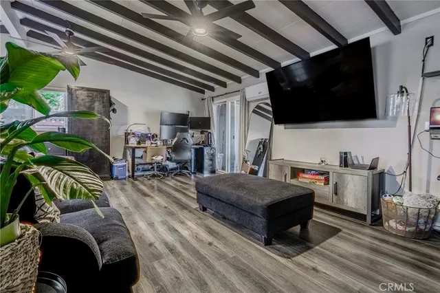 a kitchen with stainless steel appliances granite countertop a stove and cabinets