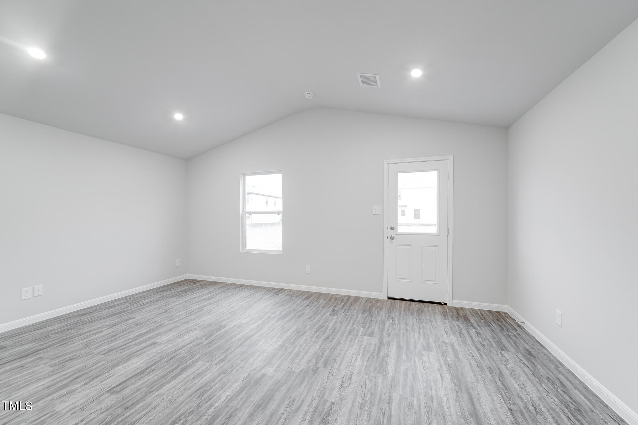 319 Maggie Lane Roxboro, NC 27573 - Photo 28 of 29 a view of empty room with wooden floor and fan