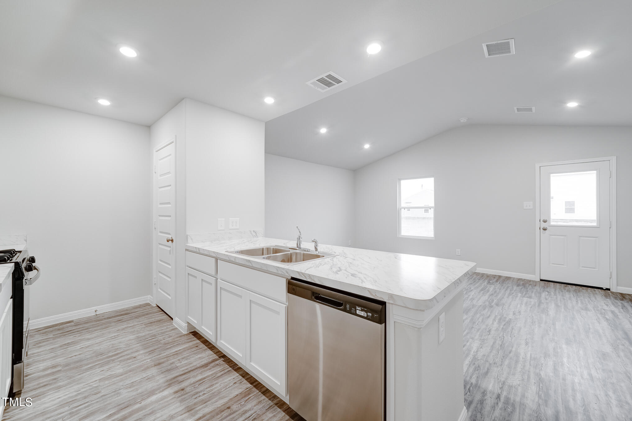 319 Maggie Lane Roxboro, NC 27573 - Photo 6 of 29 a kitchen with sink and microwave