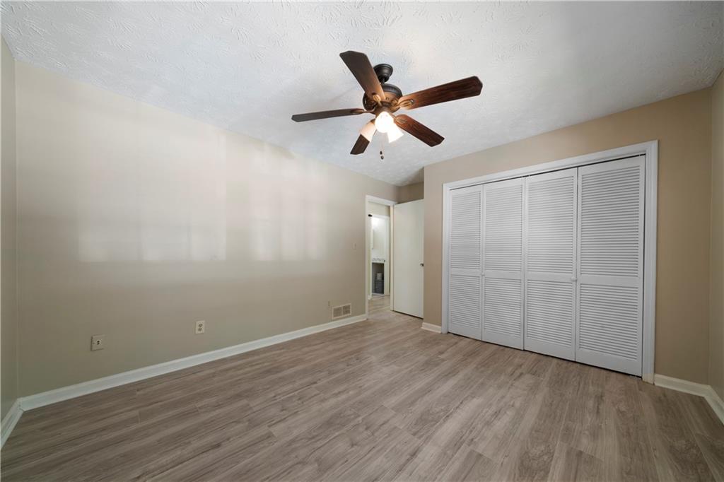 256 Powder Springs Street, Unit A Hiram, GA 30141 - Photo 12 of 16 wooden floor in an empty room