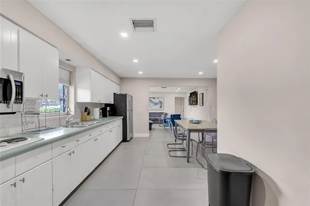 a view of a dining room with furniture