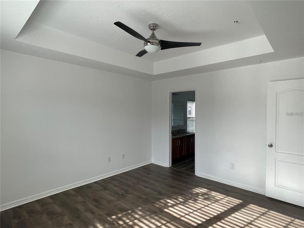 3408 Seneca Club Loop, Unit A Orlando, FL 32808 - Photo 12 of 36 a view of an empty room